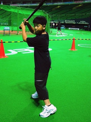 中学生のころ。バットを構えるたけるん